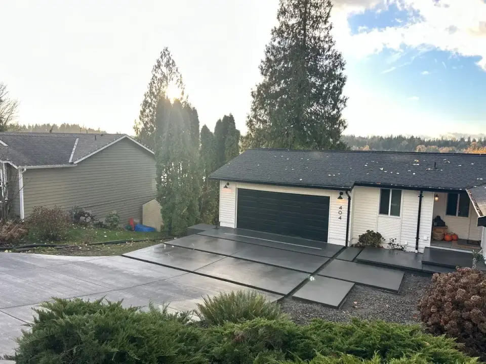 Concrete driveway construction shown in Jireh project photography