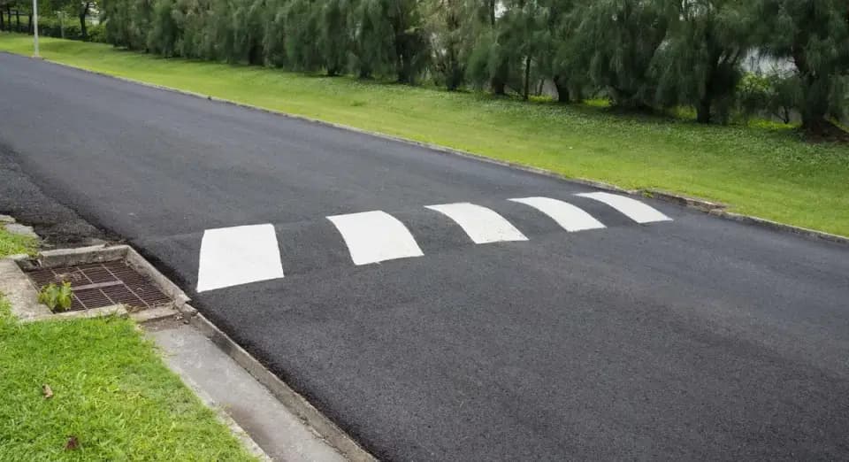 Speed bump installation for traffic calming in parking lot